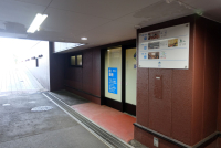 屋内駐車場入口（車いす専用）